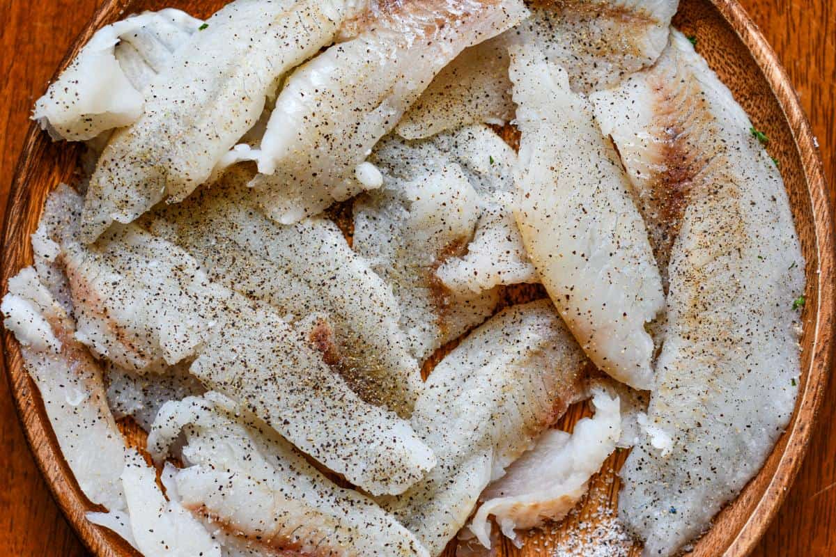 Crappie fillets seasoned with salt and pepper