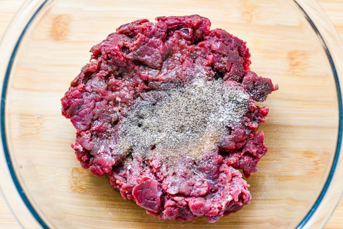 Ground venison seasoned with salt and pepper and Worcestershire sauce