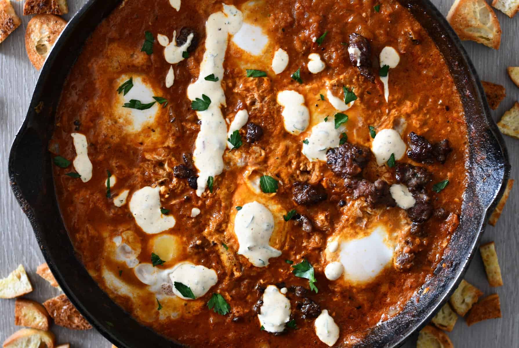 Venison and Eggs in Purgatory with Homemade Venison Sausage and Spicy Yogurt Sauce