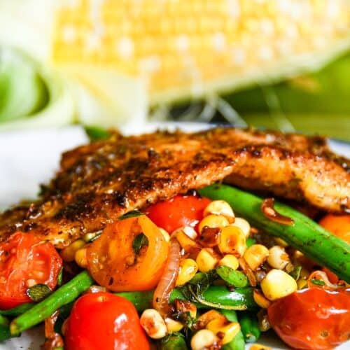 Blackened Catfish with Corn Succotash with tomatoes, onion, garlic, and green beans.