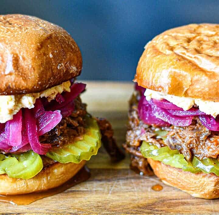 Deer BBQ Sandwiches with Pimento Cheese, Pickled Red Onions, and dill pickle chips