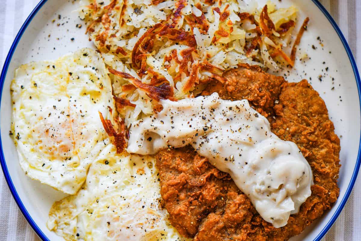 Chicken Fried Venison Steak and White Gravy Eggs Hashbrowns