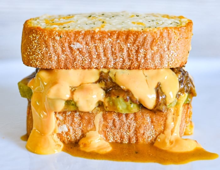 beaver meat sandwich with queso cheese on Texas toast