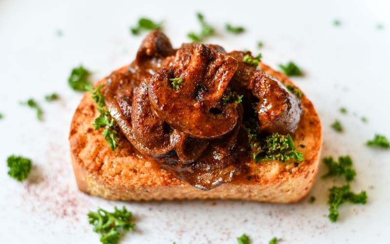 Deviled Kidney Recipe using deer kidney and mushrooms over Texas Toast.