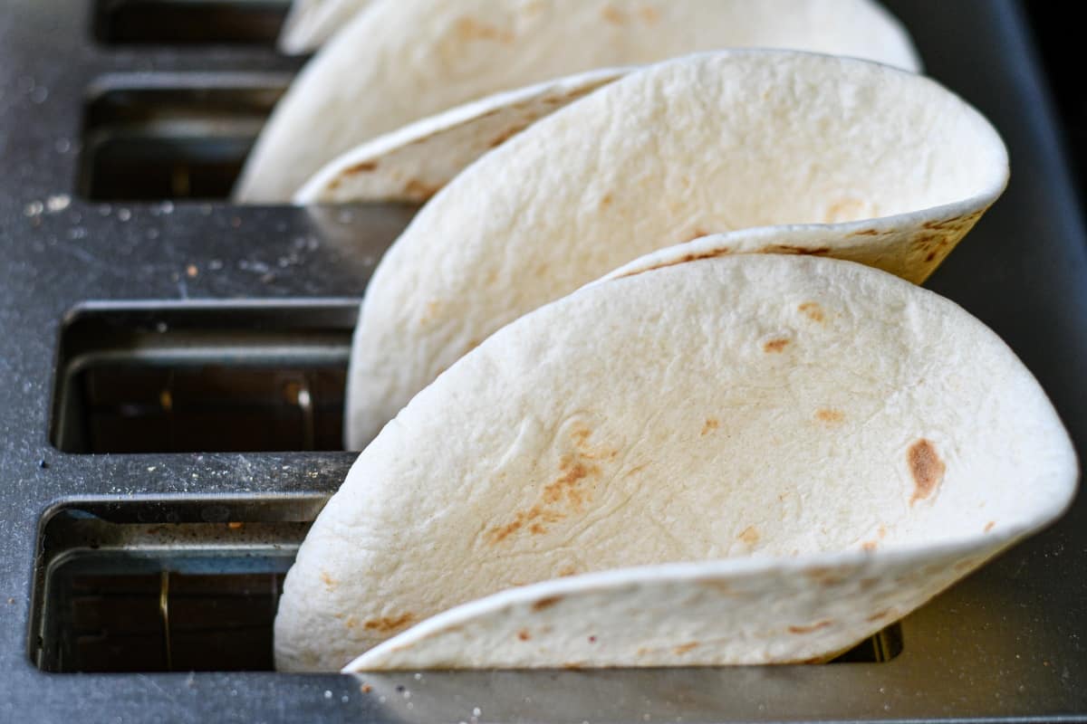 Warm your taco shells in the toaster