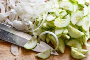 Sliced cucumbers and onion