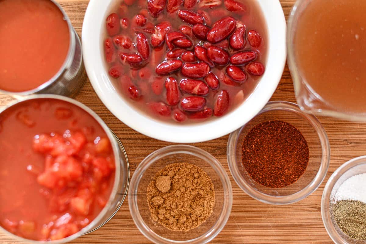 Kidney beans, diced tomatoes, tomato sauce, beef broth, and seasonings