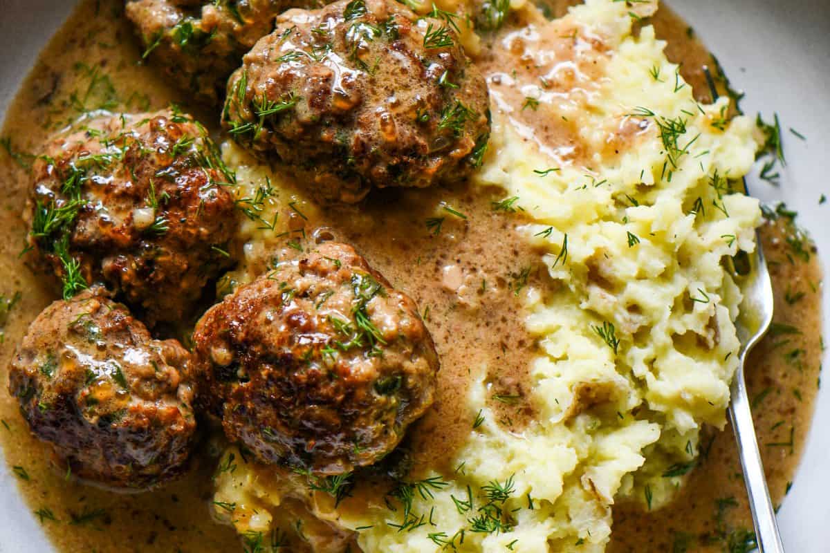Venison Swedish Meatballs with Mashed Potatoes and Fresh Dill scattered on top