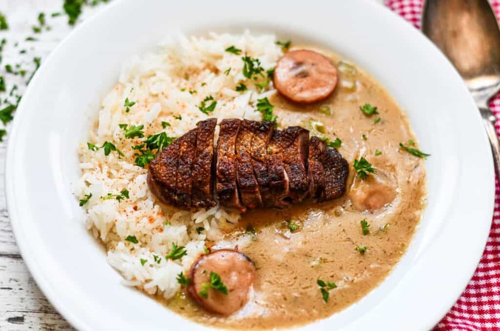 Cajun Duck Etouffee with andouille sausage and white rice