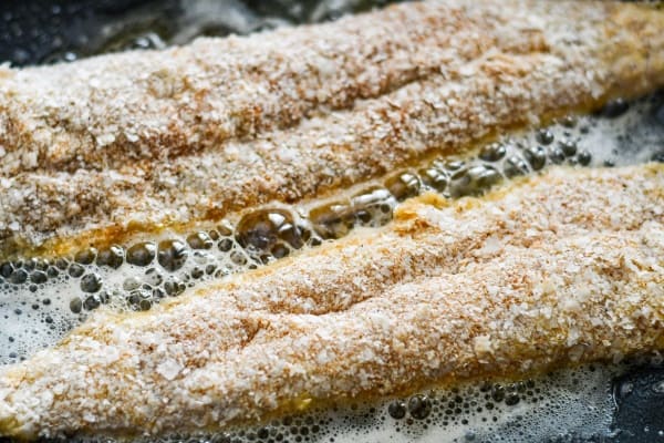 Potato Crusted Fish fried in oil and butter