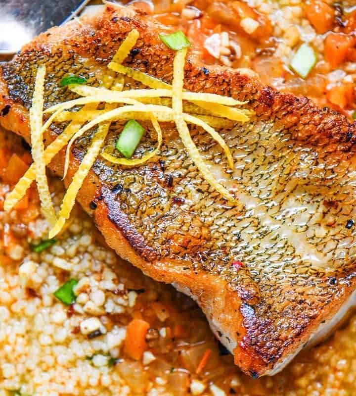 Fish Soup with Couscous and Pan Seared Walleye then garnished with fresh chives and lemon zest.