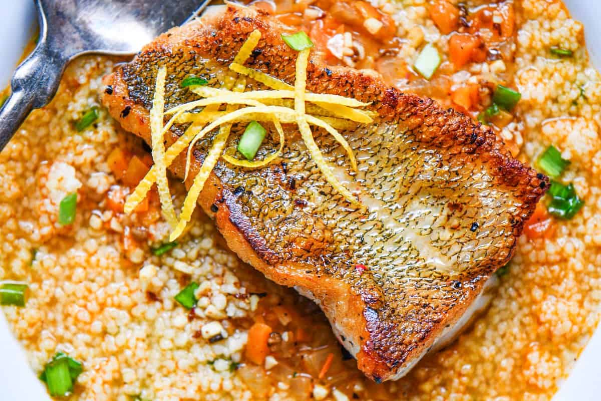 fish soup with couscous and pan seared walleye