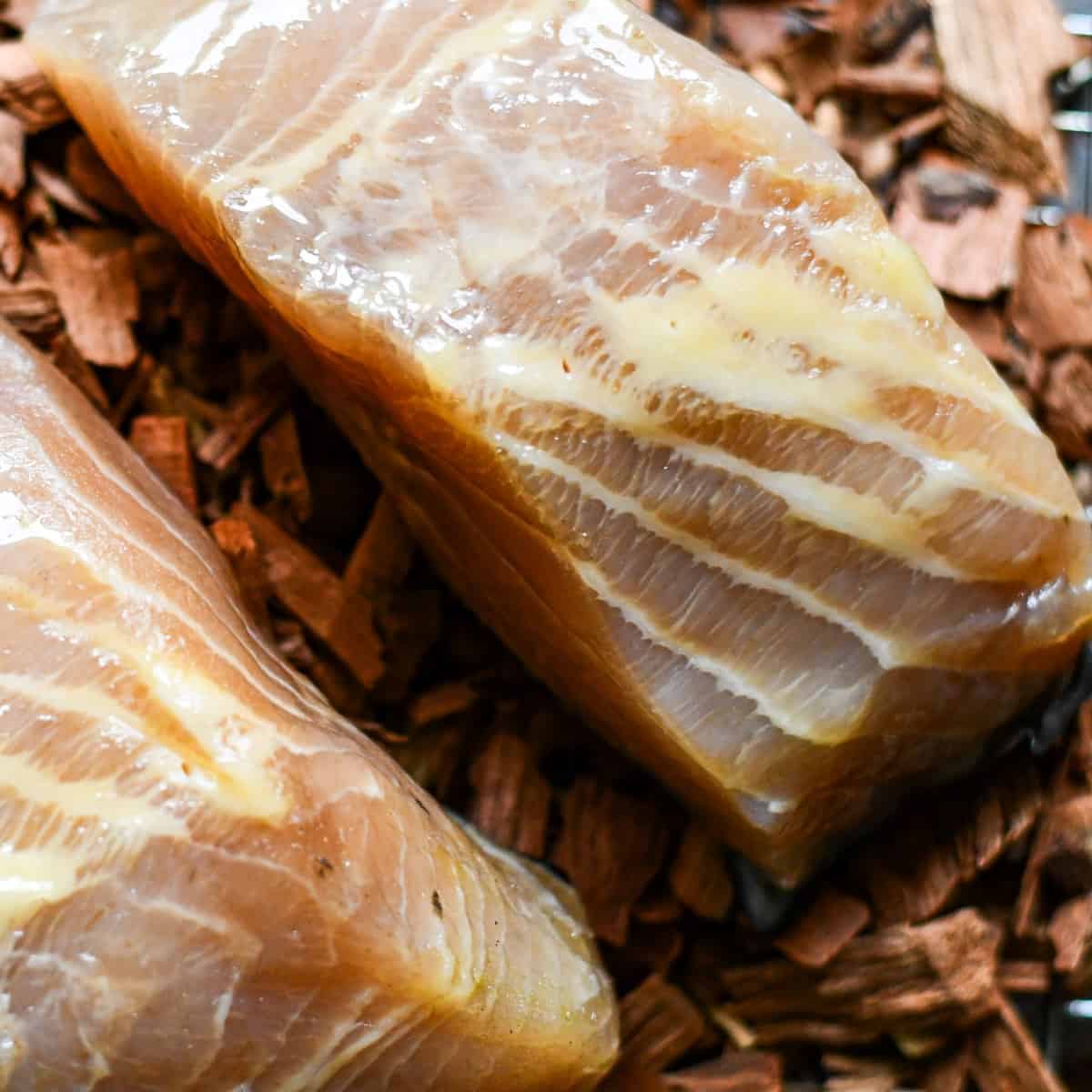 Paddlefish fillets and wood chips for smoked fish