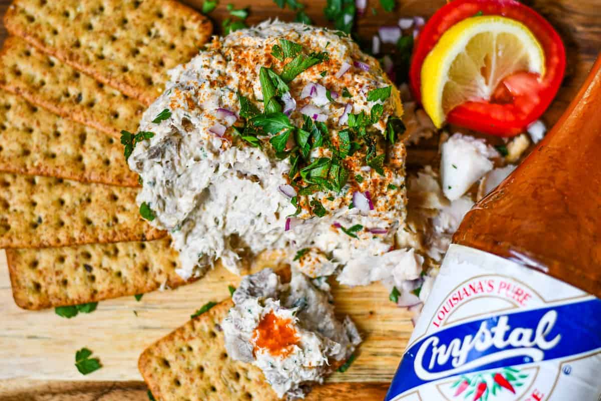 Smoked Fish Dip served with hot sauce and crackers