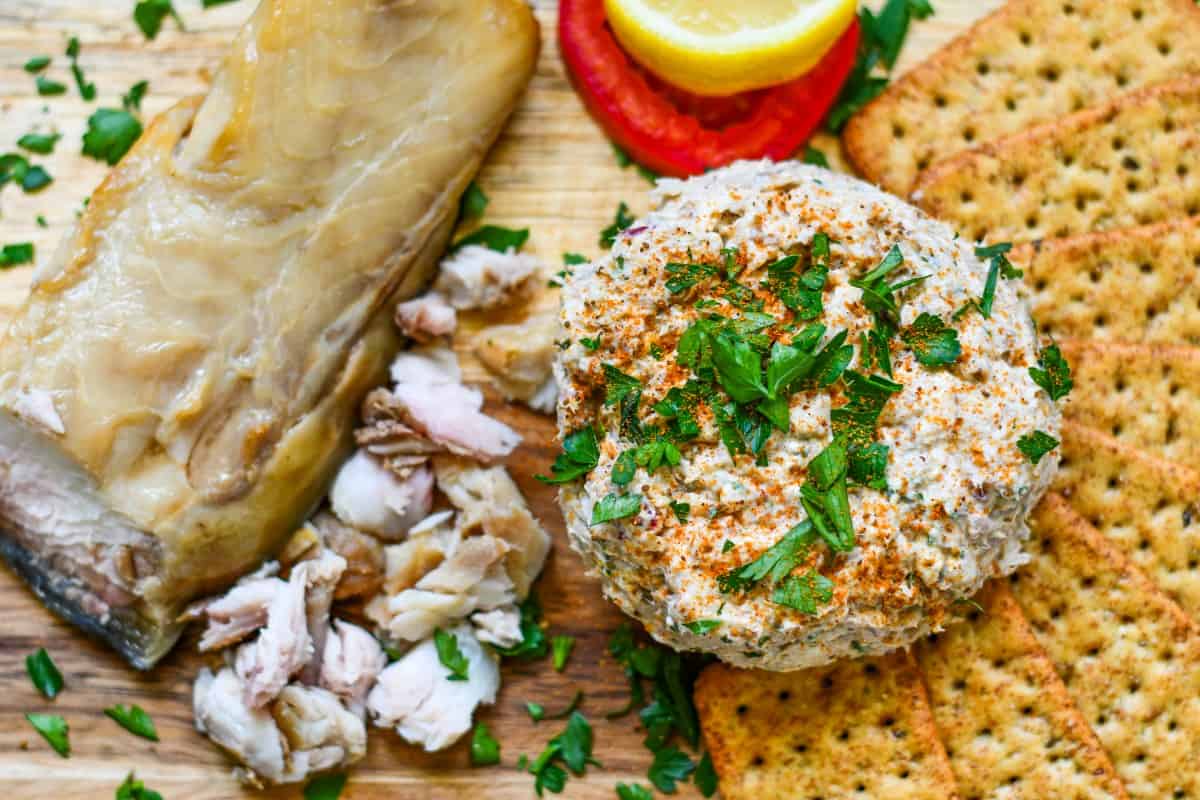 Smoked Fish Dip made with smoked American Paddlefish, mayonnaise, cream cheese, horseradish, Dijon, Worcestershire, hot sauce, lemon juice, Old Bay, and parsley. Served with crackers.