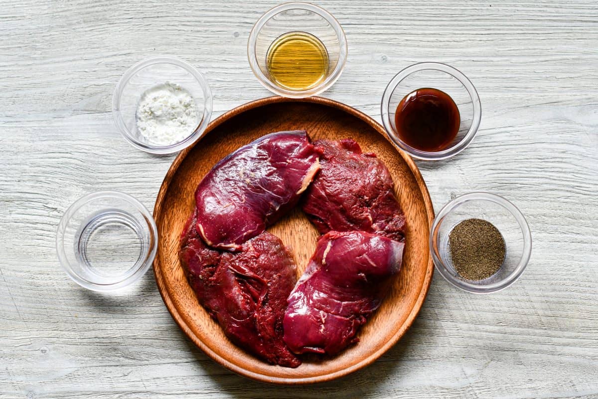 Chinese Duck Stir Fry Marinade Ingredients including mallard duck breasts, water, cornstarch, sesame oil, oyster sauce, and black pepper