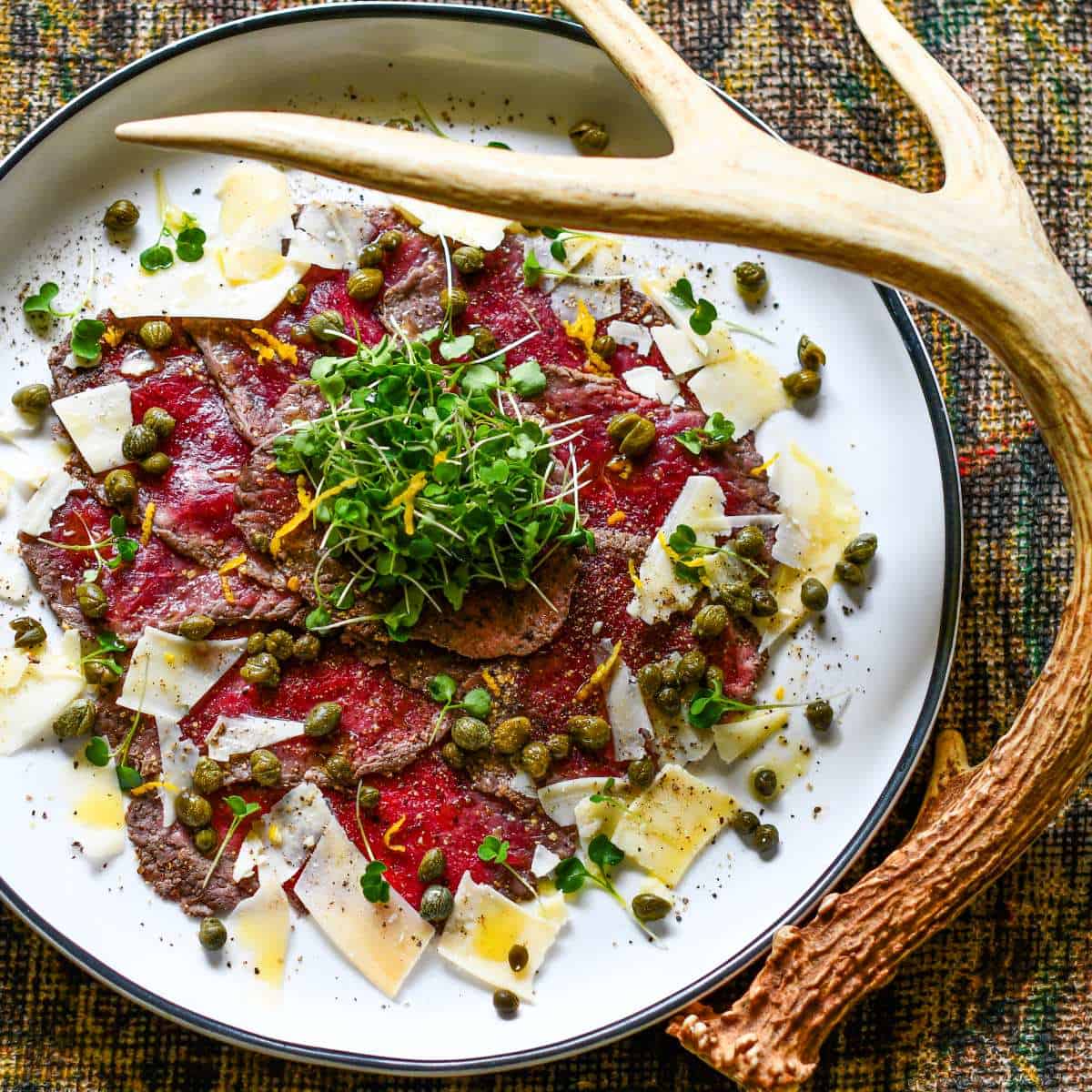 Venison Carpaccio is a raw steak dish