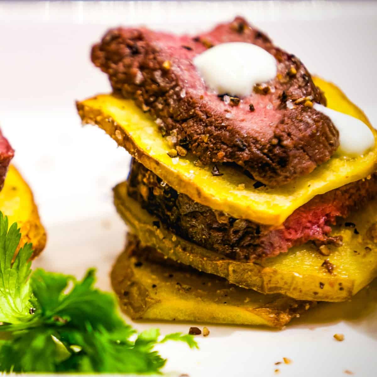 Deer Backstrap and Potato Stacks by Jeff Benda