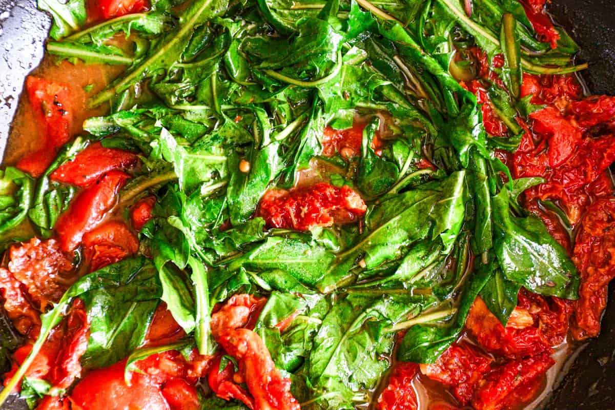 Dandelion Leaves with Sun Dried Tomatoes and Roasted Red Peppers