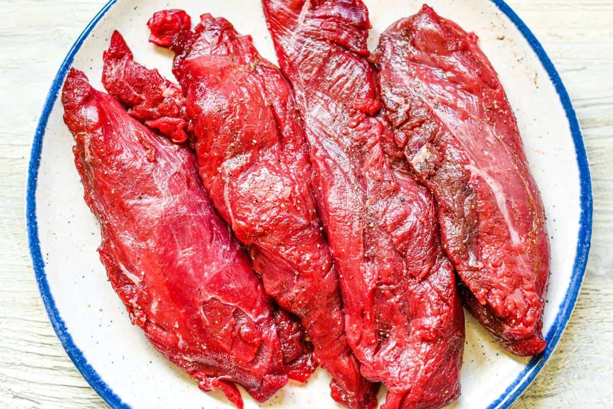Venison Tenderloin seasoned with salt and pepper by Jeff Benda