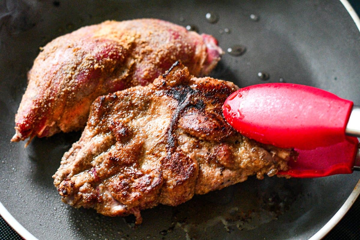 Browning Barbecue Goose Leg Quarters in Skillet