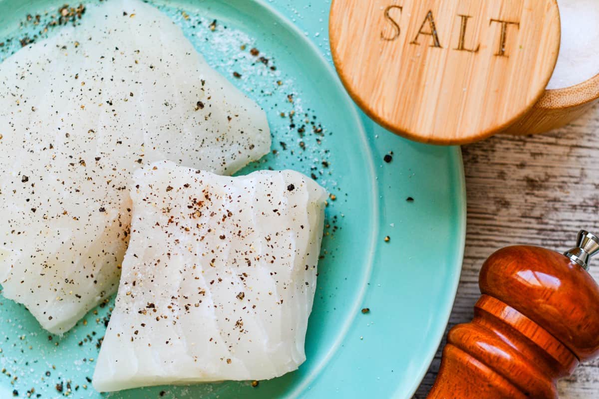 Halibut Steaks seasoned with salt and pepper