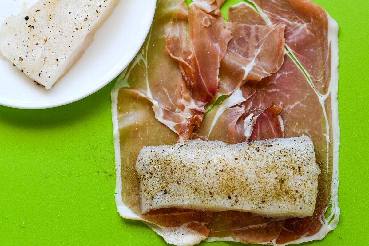Halibut wrapped in prosciutto