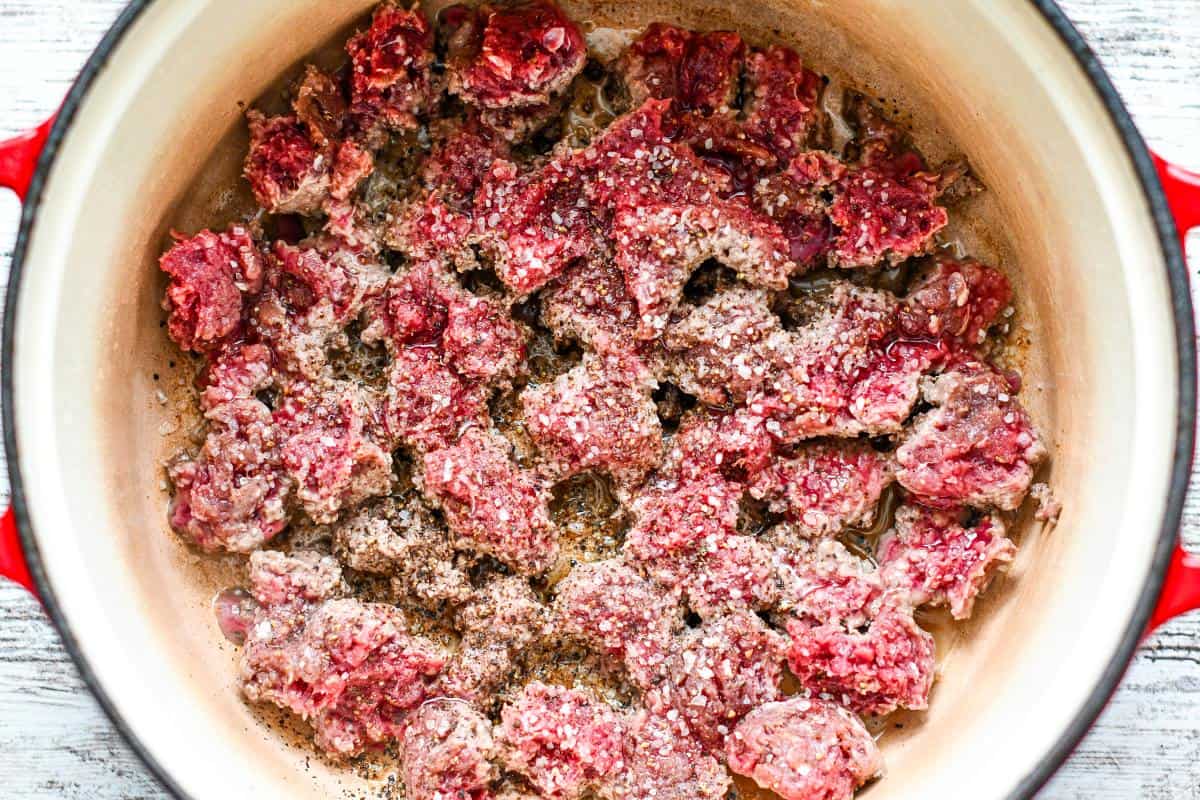 Ground Venison seasoned with salt and pepper for potato soup