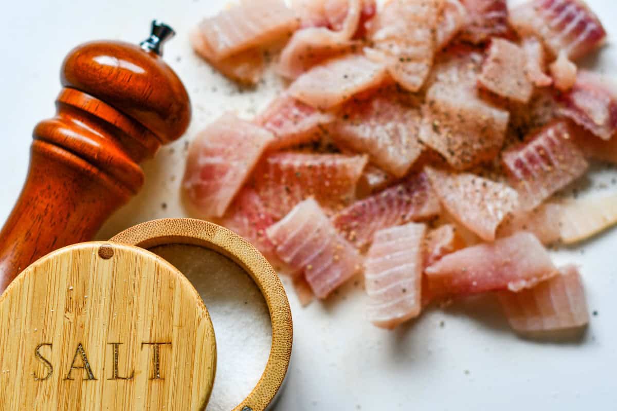 Fish seasoned with salt and pepper