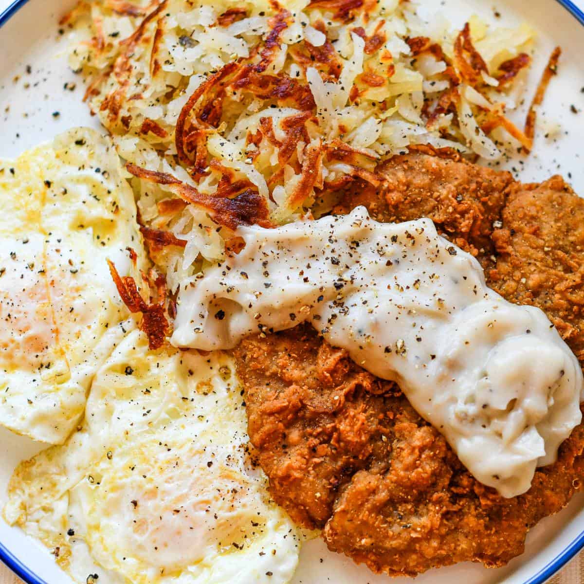 Chicken Fried Venison Steak and White Gravy Recipe with Eggs and Hashbrowns by Jeff Benda