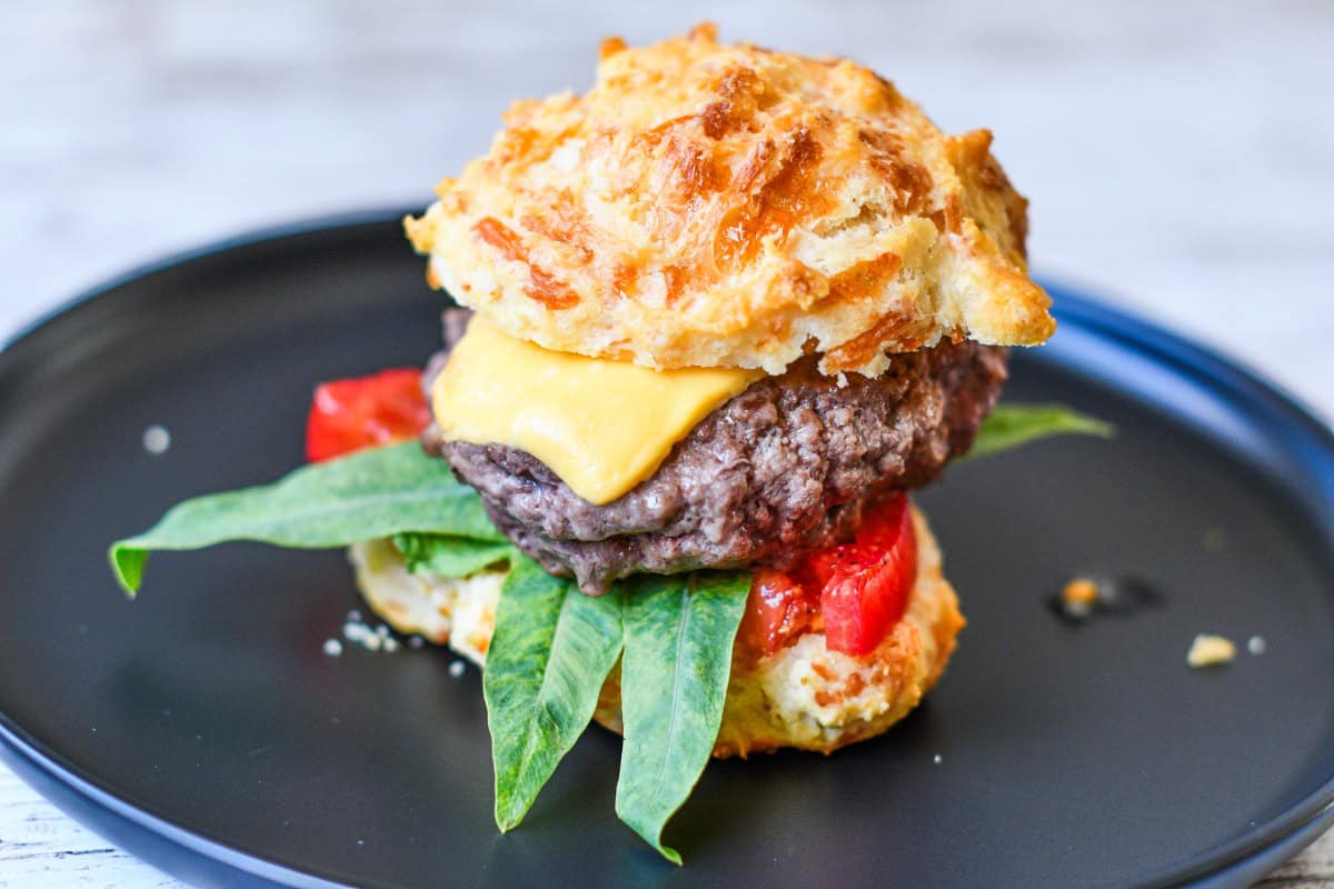 Cheddar Bay Biscuit Burgers with Deer Tongue Lettuce Tomato and Cheese